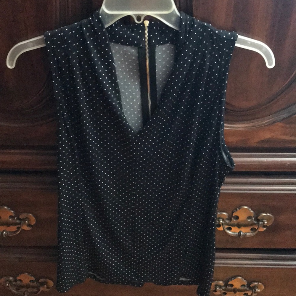 Navy and white polka dot top